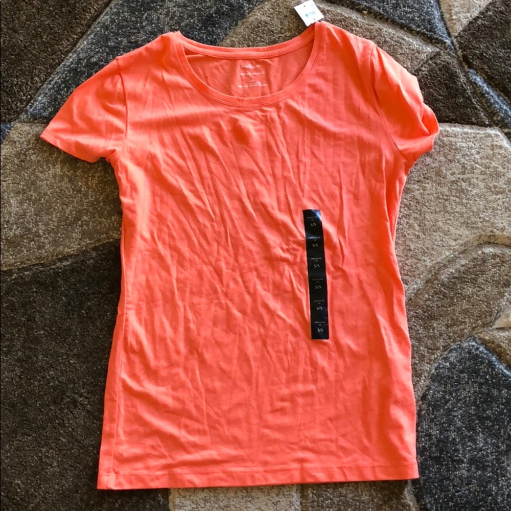 Fitted salmon colored shirt
